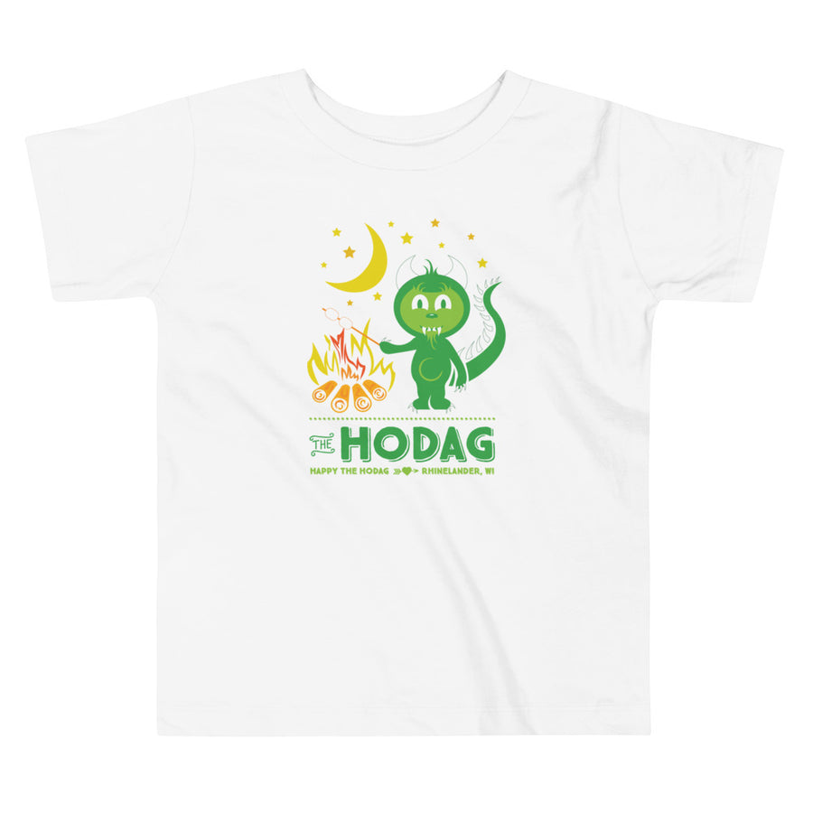 White toddler t-shirt featuring happy the Hodag roasting a marshmallow on a campfire under a cresent moon and stars. Text underneath says The Hodag, Happy the Hodag, Rhinelander, WI